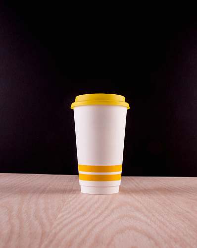 coffee cup white and yellow plastic cup travel cup